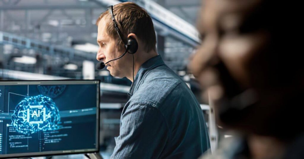 AI consultant working at a monitor displaying an AI brain visualization